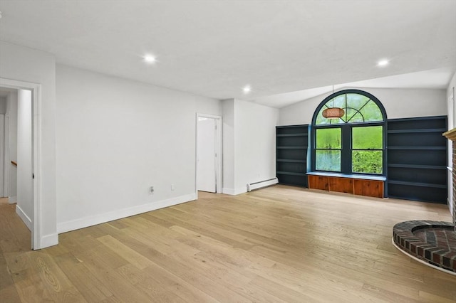 455 Main St, Rutland, MA 01543 - unfurnished living room featuring a baseboard radiator, vaulted ceiling, light wood finished floors, baseboards, and recessed lighting