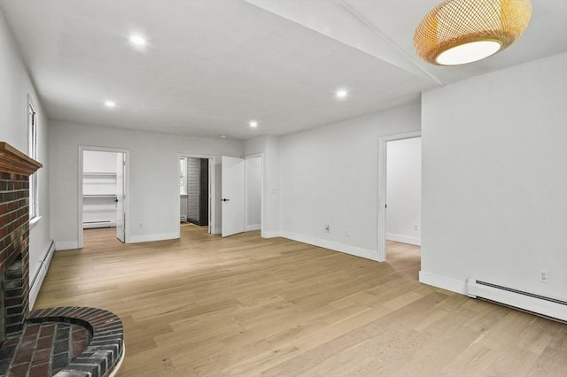 455 Main St, Rutland, MA 01543 - unfurnished living room with a baseboard radiator, light wood finished floors, recessed lighting, and baseboards