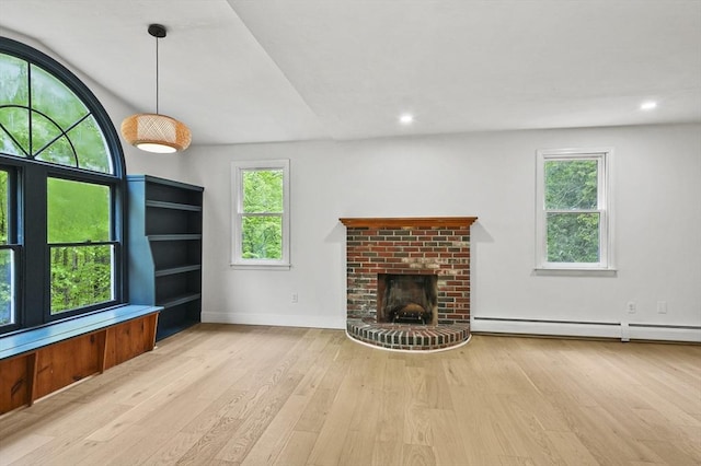 455 Main St, Rutland, MA 01543 - unfurnished living room featuring a baseboard radiator, wood finished floors, healthy amount of natural light, and recessed lighting