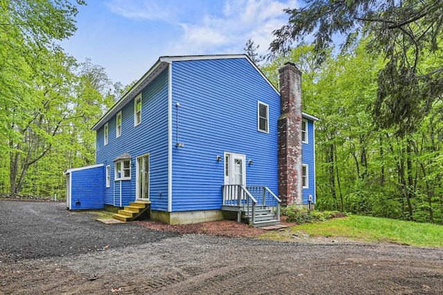 455 Main St, Rutland, MA 01543 - view of front of home featuring a chimney