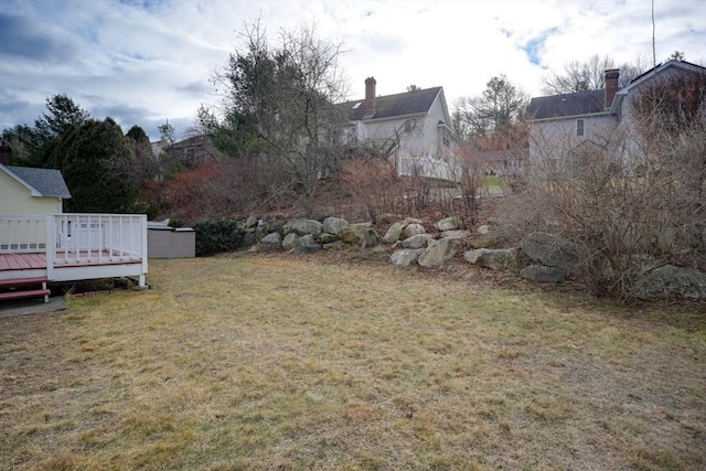 view of yard featuring a deck