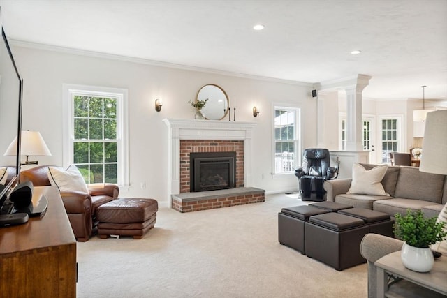 20 October Dr, Franklin, MA 02038 - carpeted living area with ornamental molding, a brick fireplace, and recessed lighting