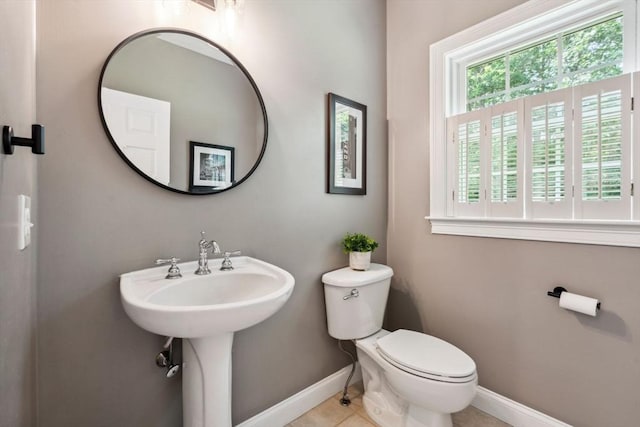 20 October Dr, Franklin, MA 02038 - half bath with baseboards and tile patterned floors