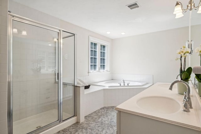 20 October Dr, Franklin, MA 02038 - full bathroom with a garden tub, a stall shower, a chandelier, double vanity, and tile patterned floors