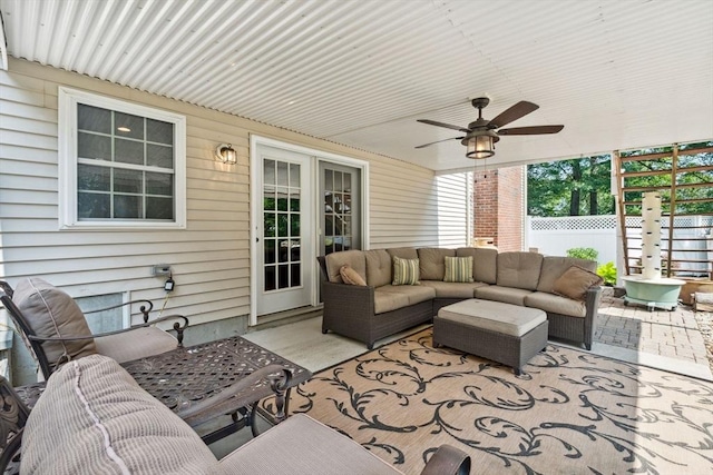 20 October Dr, Franklin, MA 02038 - living area featuring ceiling fan and wood walls