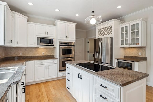20 October Dr, Franklin, MA 02038 - kitchen featuring appliances with stainless steel finishes, wine cooler, light wood finished floors, recessed lighting, and glass insert cabinets