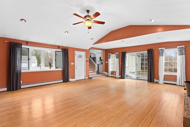 unfurnished living room featuring stairway, a ceiling fan, a baseboard radiator, light wood-style flooring, and vaulted ceiling