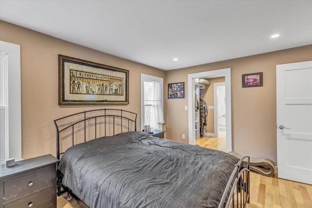 bedroom featuring recessed lighting and light wood-type flooring