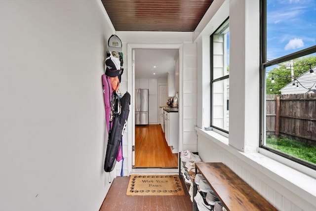 doorway to outside featuring wood finished floors