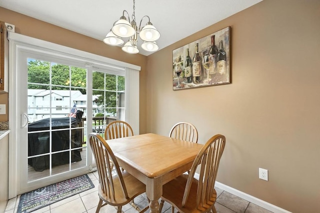 50 Waters Edge Unit 50, Ludlow, MA 01056 - dining room with a chandelier and light tile patterned flooring