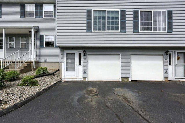 50 Waters Edge Unit 50, Ludlow, MA 01056 - view of front of property with driveway and an attached garage