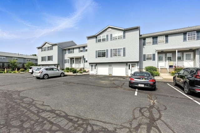 50 Waters Edge Unit 50, Ludlow, MA 01056 - multi unit property featuring uncovered parking and a residential view