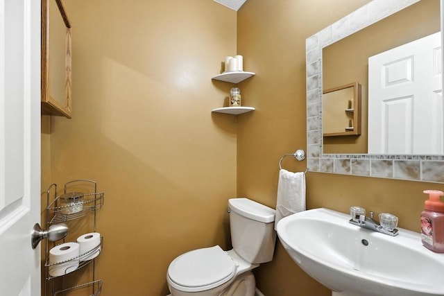 50 Waters Edge Unit 50, Ludlow, MA 01056 - half bathroom with a sink and toilet