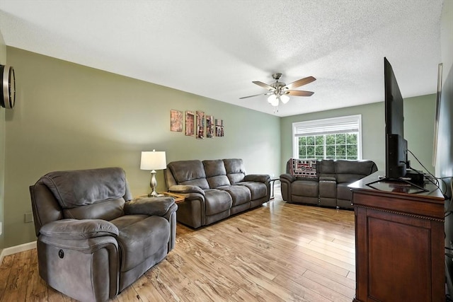 50 Waters Edge Unit 50, Ludlow, MA 01056 - living room with a ceiling fan, light wood-type flooring, and a textured ceiling