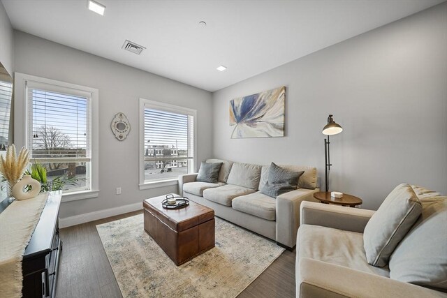 11 Walley St Unit 202, Boston, MA 02128 - living room featuring baseboards and wood finished floors