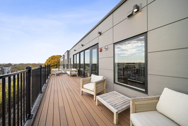 11 Walley St Unit 202, Boston, MA 02128 - deck featuring an outdoor living space