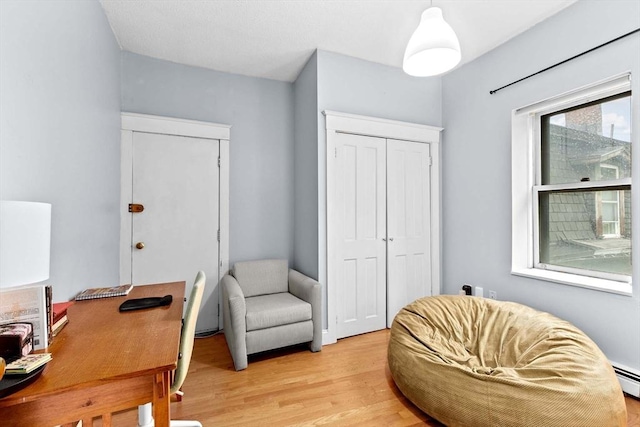 46A Cedar St Unit 2, Boston, MA 02119 - sitting room with light wood finished floors and a desk