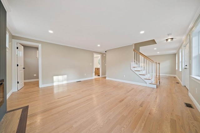 56 Lake St, Braintree, MA 02184 - unfurnished living room with stairway, light wood-style flooring, baseboards, ornamental molding, and recessed lighting
