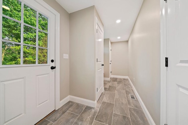 56 Lake St, Braintree, MA 02184 - doorway with healthy amount of natural light, baseboards, and recessed lighting