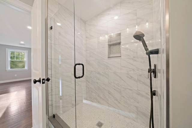 56 Lake St, Braintree, MA 02184 - full bath with a shower stall, wood finished floors, and baseboards