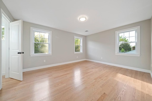 56 Lake St, Braintree, MA 02184 - empty room with light wood-style floors and baseboards