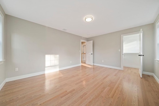 56 Lake St, Braintree, MA 02184 - unfurnished bedroom with light wood finished floors and baseboards