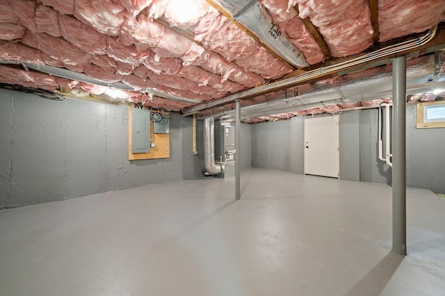 56 Lake St, Braintree, MA 02184 - unfinished below grade area with heating unit and electric panel
