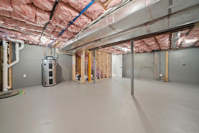 56 Lake St, Braintree, MA 02184 - unfinished below grade area featuring hybrid water heater