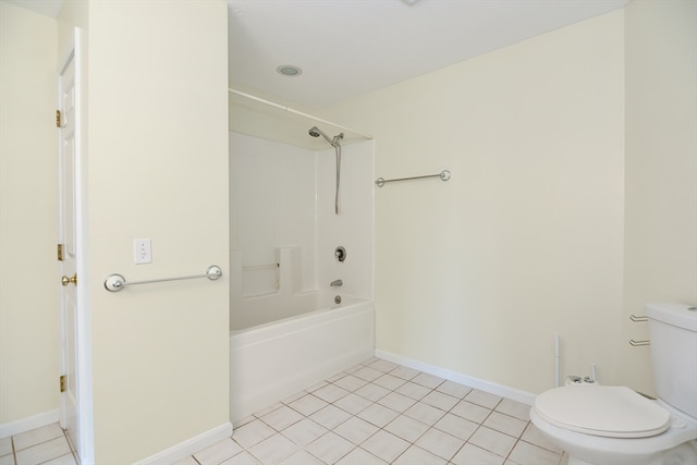 bathroom featuring toilet, tile patterned flooring, and shower / bathtub combination