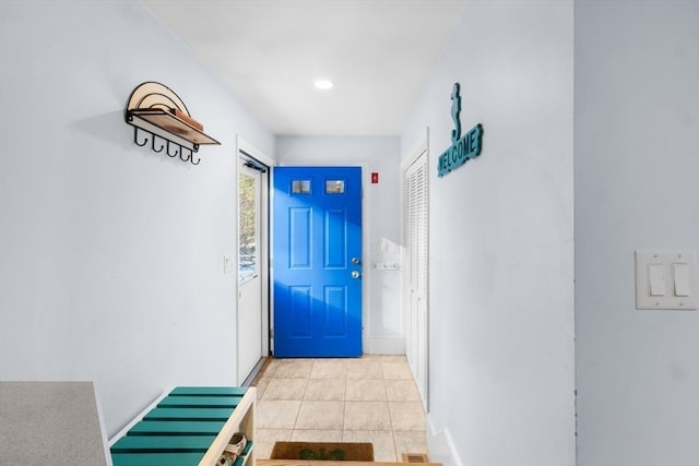 interior space featuring light tile patterned flooring