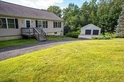 185 Baldwinville Rd, Winchendon, MA 01475 - view of front of house featuring a detached garage, an outbuilding, and a front lawn