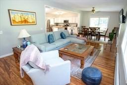 185 Baldwinville Rd, Winchendon, MA 01475 - living room with wood finished floors, baseboards, and a ceiling fan