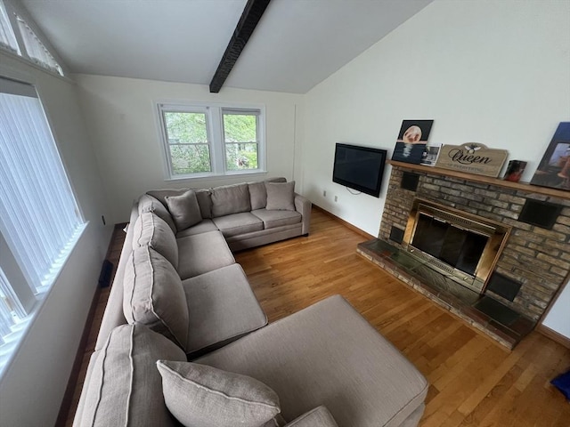 18 Blueberry Ln, Barnstable, MA 02648 - living area with wood finished floors and a glass covered fireplace