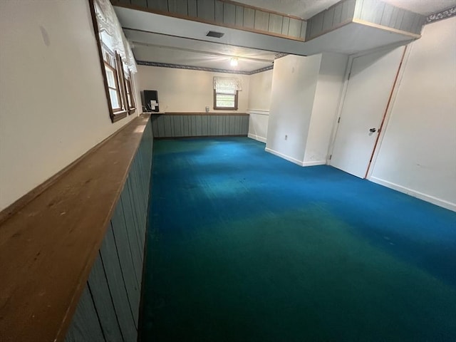 18 Blueberry Ln, Barnstable, MA 02648 - basement featuring carpet floors and a wainscoted wall