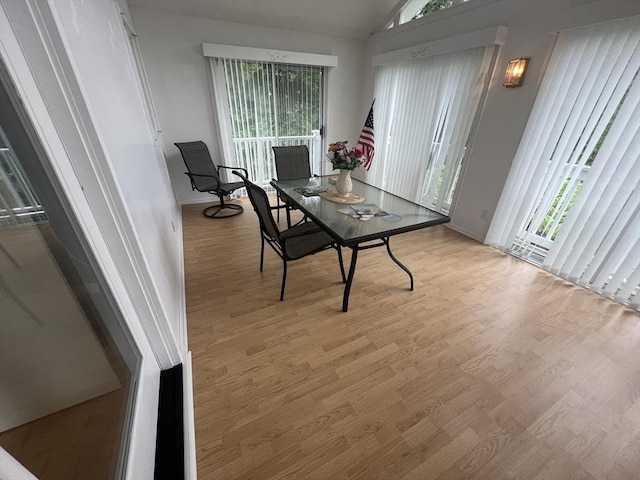 18 Blueberry Ln, Barnstable, MA 02648 - dining area with plenty of natural light, wood finished floors, and vaulted ceiling