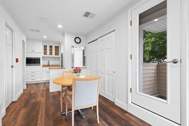 35 Des Moines Rd Unit 310, Quincy, MA 02169 - dining room with crown molding, dark wood-style flooring, and recessed lighting