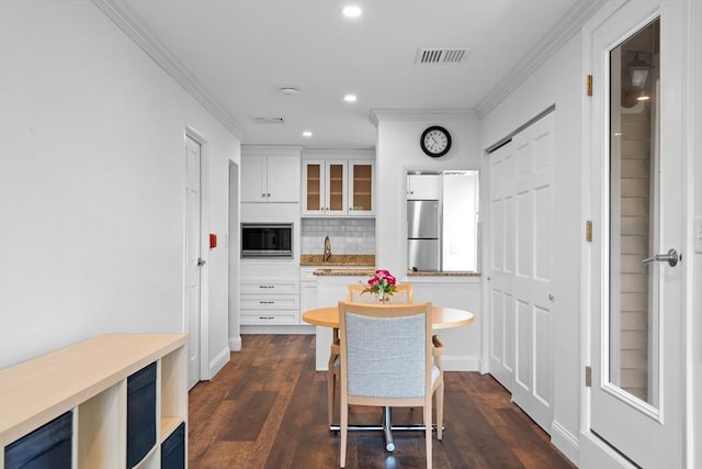 35 Des Moines Rd Unit 310, Quincy, MA 02169 - dining area with ornamental molding, recessed lighting, and dark wood-type flooring