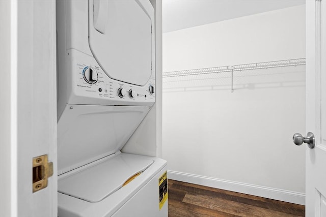 35 Des Moines Rd Unit 310, Quincy, MA 02169 - laundry room with stacked washing machine and dryer and dark wood finished floors