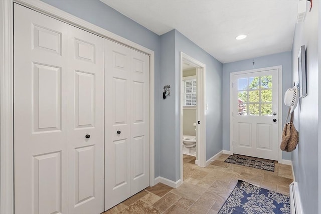 9 Bateson Dr, Andover, MA 01810 - entrance foyer featuring stone tile floors, baseboards, a baseboard heating unit, and recessed lighting