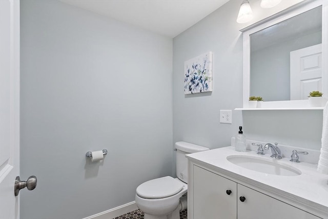 9 Bateson Dr, Andover, MA 01810 - half bathroom with toilet, vanity, and baseboards