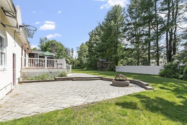 9 Bateson Dr, Andover, MA 01810 - view of yard with a fire pit, a patio area, and a wooden deck