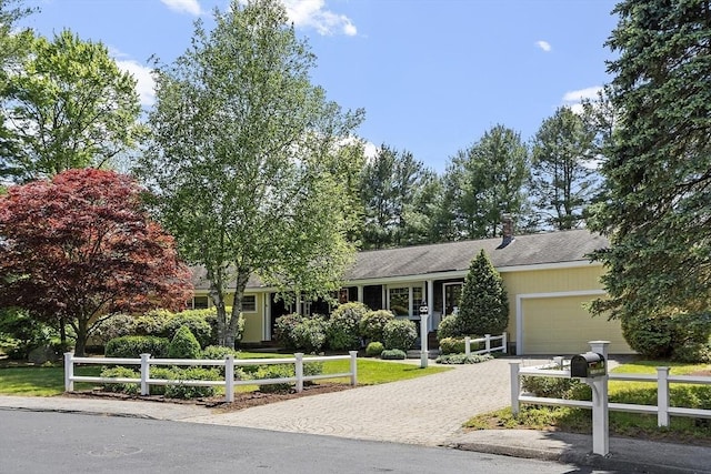 9 Bateson Dr, Andover, MA 01810 - view of front of home with a garage and driveway