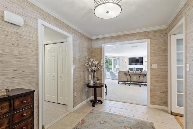 9 Bateson Dr, Andover, MA 01810 - hall with baseboards, wallpapered walls, tile patterned flooring, crown molding, and carpet floors