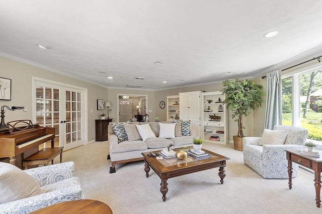 9 Bateson Dr, Andover, MA 01810 - living room featuring french doors, light colored carpet, crown molding, and recessed lighting
