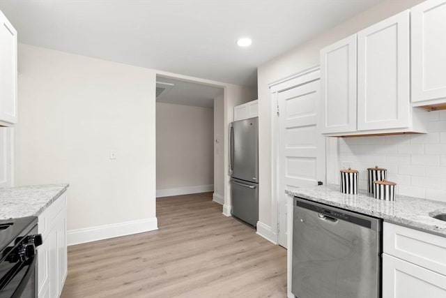 3 Regent Cir Unit 3, Boston, MA 02130 - kitchen featuring stainless steel appliances, white cabinets, decorative backsplash, light wood-style floors, and recessed lighting