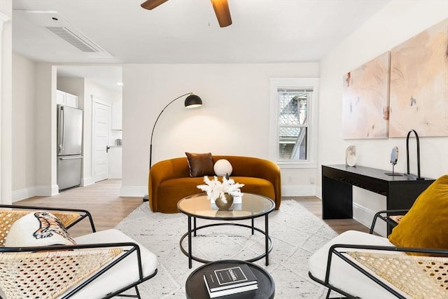 3 Regent Cir Unit 3, Boston, MA 02130 - living area with light wood-style floors, baseboards, and a ceiling fan