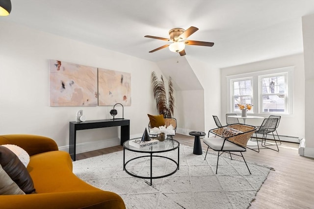 3 Regent Cir Unit 3, Boston, MA 02130 - living area featuring ceiling fan, wood finished floors, baseboards, and baseboard heating