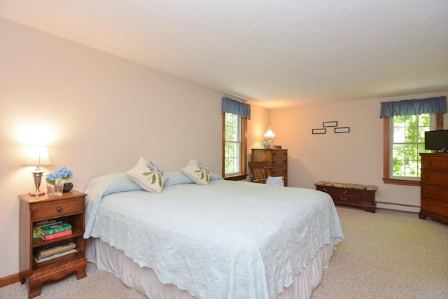 33 Rockmeadow Rd, Uxbridge, MA 01569 - bedroom featuring a baseboard radiator, light carpet, and baseboards
