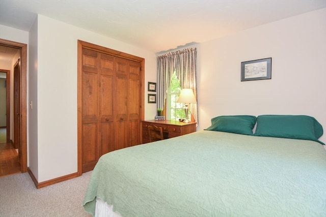 33 Rockmeadow Rd, Uxbridge, MA 01569 - bedroom featuring a closet, light carpet, and baseboards