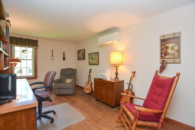 33 Rockmeadow Rd, Uxbridge, MA 01569 - office area with a wall mounted air conditioner, wood finished floors, and baseboards